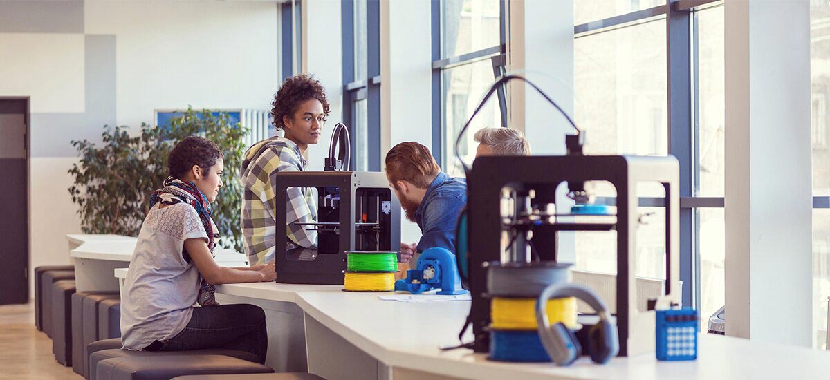 Start up business team working in 3D printer office.jpg
